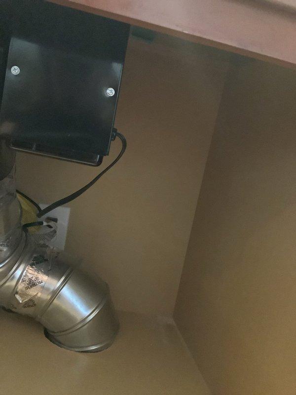 Installed new electrical line in 10-year-old residential property, routing wiring through attic crawl space alongside existing HVAC ductwork and structural framing. Work included running cable along wooden beams to designated termination point, installing electrical panel with cover plate in utility area, and ensuring proper clearances from metal ductwork per code requirements.