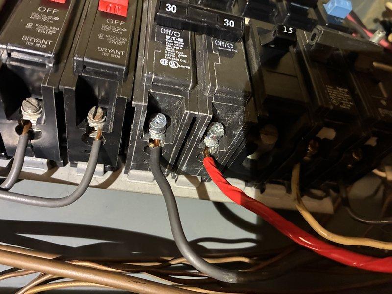 Responded to report of water heater failure caused by electrical panel malfunction. Inspected electrical panel box and identified multiple circuit breakers with potential issues, including 30-amp and 15-amp Bryant breakers showing signs of failure. Documented existing wiring connections and breaker conditions through photographs for assessment. Recommended panel evaluation for possible breaker replacement or complete panel upgrade to restore proper function to water heater circuit and ensure safe electrical distribution throughout the property.