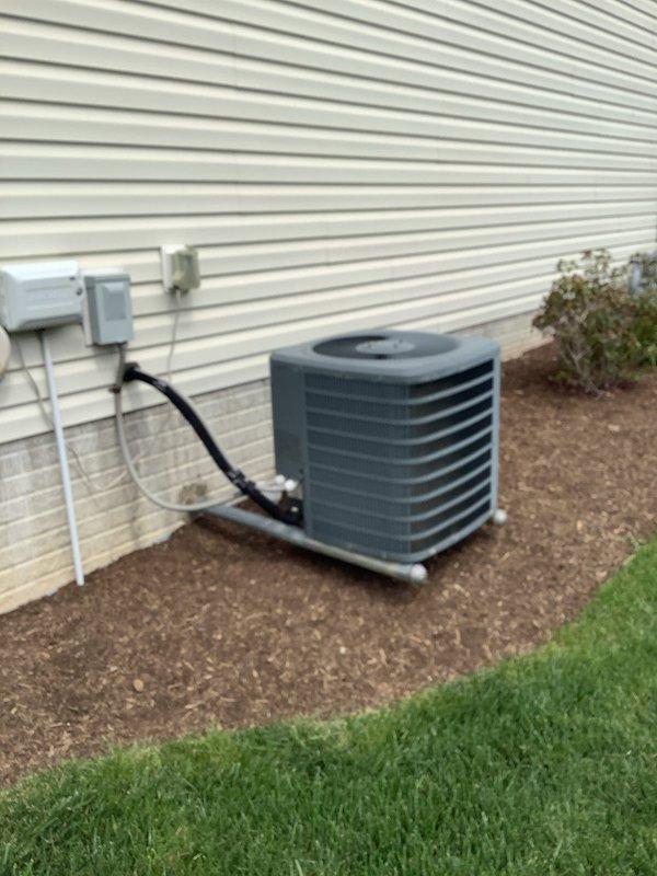 # HVAC Maintenance - Cooling

Completed comprehensive preventive maintenance on a 10-year-old residential air conditioning system. Performed full system inspection of both indoor and outdoor components, including furnace/air handler unit with refrigerant lines and outdoor condenser unit. Verified proper operation of all electrical connections, disconnect box, and conduit routing. Inspected condensate drainage system with PVC piping, checked refrigerant line insulation integrity, and confirmed adequate airflow through ductwork. Cleaned condenser coils, verified fan operation, and ensured unit is operating within manufacturer specifications. System is functioning properly with no immediate concerns noted.