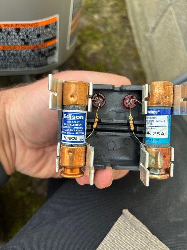 Completed MVP recurring cooling maintenance visit. Inspected and replaced dual element Class RK5 25-amp fuses in the electrical disconnect, ensuring proper overcurrent protection for the HVAC system. Examined air handler unit and verified flexible ductwork connection and filter assembly were properly secured and functioning correctly.
