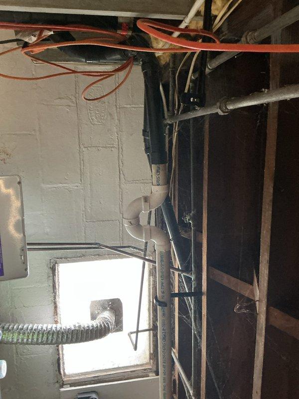 Responded to water leak originating from bathtub drain and penetrating through floor into kitchen below. Upon inspection, confirmed no existing access panel available for direct access to drain assembly. Assessed leak source through floor register opening and basement area, documenting conditions of affected plumbing system and surrounding structure for repair planning.