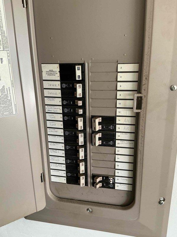 Conducted comprehensive electrical estimate for generator installation at residential property. Documented existing electrical infrastructure by photographing main circuit breaker panel, noting current breaker configuration, available panel capacity, and circuit labeling system. Assessed panel condition, wiring connections, and determined feasibility for integrating generator transfer switch or interlock system with existing electrical distribution equipment.