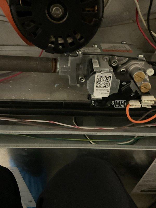 Responded to service call regarding natural gas odor detected when furnace had been idle for several days. Performed comprehensive safety inspection of gas valve assembly, burner components, and all gas connections. Inspected blower motor, electrical connections, and wiring harnesses for proper operation. Conducted leak detection testing on gas valve, manifold connections, and supply lines. All components found to be functioning within normal parameters with no active gas leaks detected at time of inspection. Advised customer on proper system operation and recommended monitoring for any recurring odor issues.