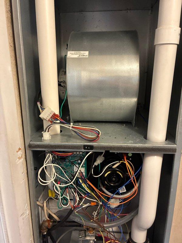 Completed annual air conditioning tune-up and system inspection on Airtemp unit. Performed comprehensive evaluation of indoor air handler components including blower motor, electrical connections, and control board, confirming all wiring harnesses and mechanical components operating within normal parameters. Inspected outdoor condenser unit, verified proper operation of compressor and fan motor, and checked refrigerant levels and system pressures. All components found to be functioning properly with no immediate service needs identified.