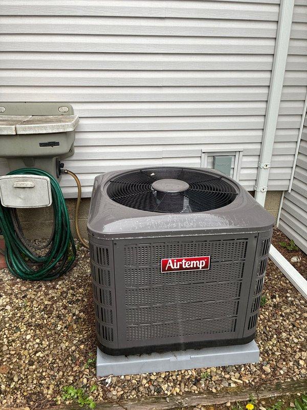 Completed annual air conditioning tune-up and system inspection on Airtemp unit. Performed comprehensive evaluation of indoor air handler components including blower motor, electrical connections, and control board, confirming all wiring harnesses and mechanical components operating within normal parameters. Inspected outdoor condenser unit, verified proper operation of compressor and fan motor, and checked refrigerant levels and system pressures. All components found to be functioning properly with no immediate service needs identified.