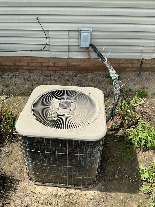 Completed comprehensive HVAC system replacement estimate for residential property. Assessed existing Criterion II furnace installation in basement utility area with deteriorating ductwork insulation and aging yellow pleated air filter, along with exterior condensing unit showing significant weathering, grime accumulation on grille panels, and ground-level placement concerns. Provided detailed replacement recommendations for complete heating and cooling system upgrade to improve efficiency and reliability.