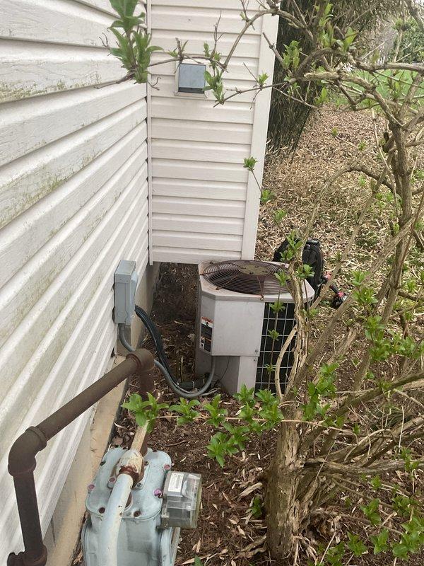 Completed seasonal AC tune-up on outdoor condensing unit. Performed standard maintenance inspection including checking refrigerant levels, cleaning condenser coils, testing electrical connections, and verifying proper system operation. Installed complimentary carbon monoxide detector as part of promotional service package.