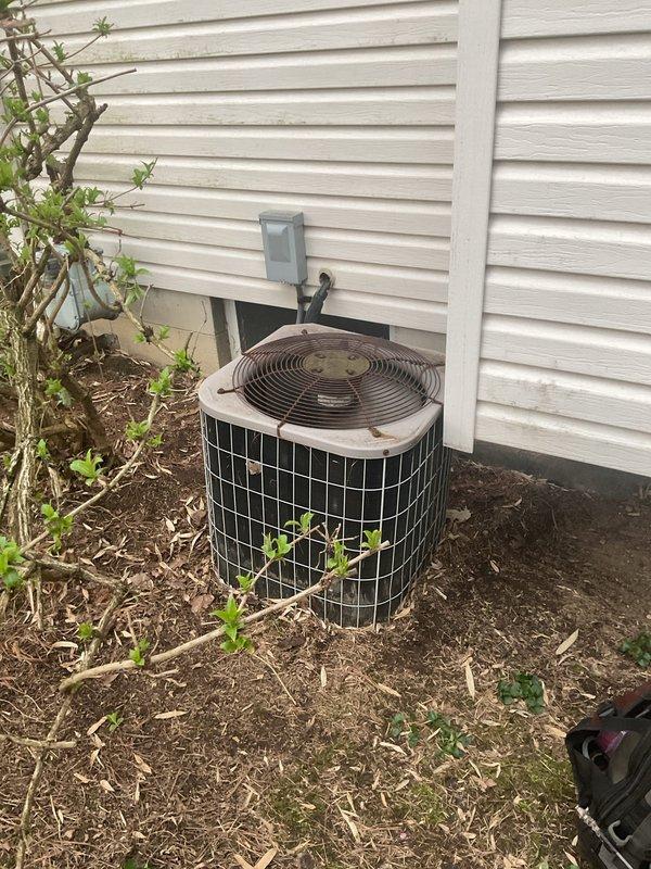 Completed seasonal AC tune-up on outdoor condensing unit. Performed standard maintenance inspection including checking refrigerant levels, cleaning condenser coils, testing electrical connections, and verifying proper system operation. Installed complimentary carbon monoxide detector as part of promotional service package.