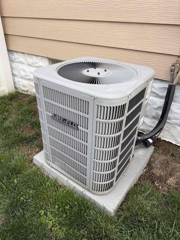 Completed scheduled MVP air conditioning maintenance on Heil outdoor condenser unit. Performed comprehensive system inspection including electrical connections at attic-mounted control box, verified proper operation of all components, and documented equipment condition with photos showing unit in good working order with no visible deficiencies noted.