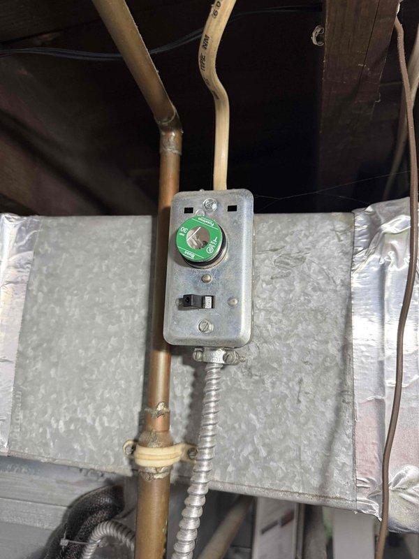 Completed scheduled MVP air conditioning maintenance on Heil outdoor condenser unit. Performed comprehensive system inspection including electrical connections at attic-mounted control box, verified proper operation of all components, and documented equipment condition with photos showing unit in good working order with no visible deficiencies noted.
