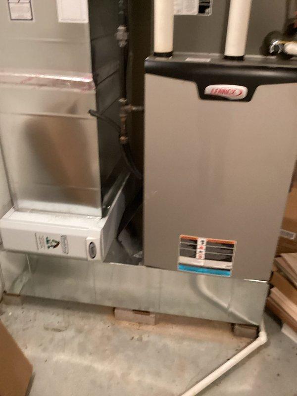 Completed scheduled cooling maintenance on Lennox HVAC system (Model CX35-60C-6F). Performed comprehensive system inspection, verified refrigerant pressures within manufacturer specifications (minimum 440 PSIG), and cleaned evaporator coils using water only per equipment guidelines. Inspected furnace cabinet, humidifier unit, ductwork, and PVC condensate lines for proper operation. All components functioning normally with no issues identified.