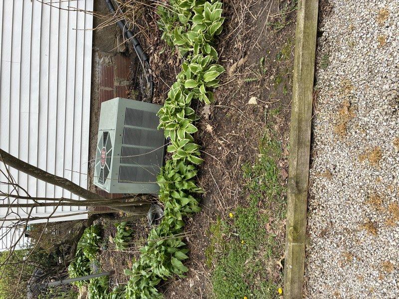 Completed comprehensive tune-up maintenance on 15-year-old residential air conditioning system. Accessed outdoor condenser unit, inspected electrical components including capacitor and wiring connections, verified condenser fan operation, and evaluated overall system condition. Unit shows age-appropriate wear with weathering on exterior surfaces but remains operational; all electrical connections secure and functional at time of service.
