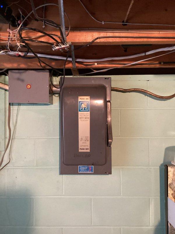 Responded to customer report of flickering lights and fixtures not staying on fully. Performed comprehensive electrical system inspection, examining main service panel, disconnect box, circuit breakers, and associated wiring throughout the premises. Inspected electrical connections at panel boxes, verified proper breaker seating, checked for loose connections, and tested voltage levels to identify source of lighting issues. All electrical components were evaluated for code compliance and proper operation to resolve the intermittent power delivery affecting the lighting fixtures.