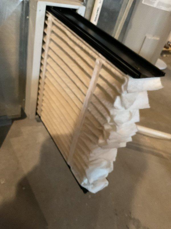 Completed scheduled maintenance visit on 12-year-old heat pump system. Inspected internal components including evaporator coil assembly, refrigerant lines, and electrical connections. Checked air filter condition at return air grille. All components found in operational condition with normal dust accumulation for system age. System operating within manufacturer specifications.