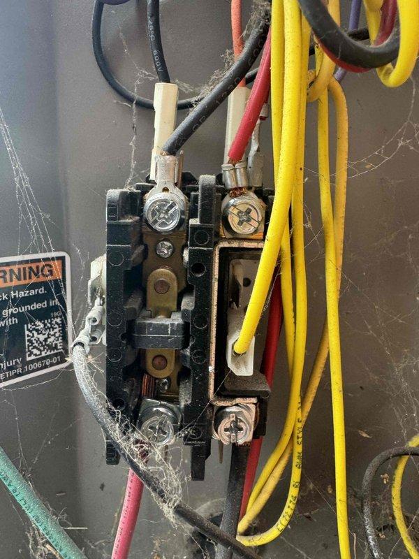 Completed routine air conditioning maintenance on 5-year-old system. Performed comprehensive inspection of electrical connections and terminal blocks, noting significant cobweb accumulation on wiring and control panel components. Cleaned heavily soiled air intake louvers and ventilation slats that showed extensive dust and debris buildup, which was restricting proper airflow. All electrical connections verified secure, system tested and operating within normal parameters upon completion.