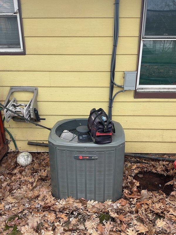 Completed MVP cooling maintenance visit on 13-year-old Trane system. Inspected indoor air handler components including filter media, ductwork connections, and electrical controls; filter showed normal dust accumulation for service interval. Evaluated outdoor condensing unit, verified proper installation clearances, and documented system condition with photographic records for maintenance history.