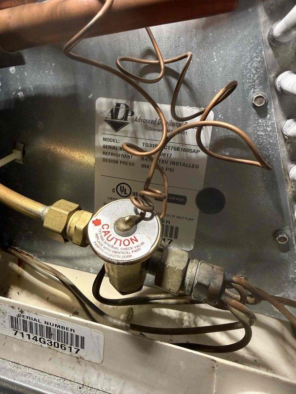 Completed comprehensive AC tune-up on Advanced Distributor Products system, including inspection of electrical control panel wiring connections, refrigerant line connections, and brass valve fittings. Verified proper wire terminations, examined copper tubing coils for integrity, and confirmed all safety labels and caution tags were properly displayed per manufacturer specifications.