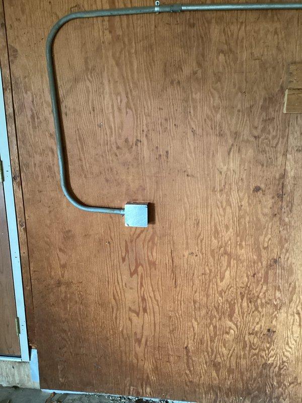 Completed comprehensive electrical safety upgrades and code compliance work throughout the residence. Installed duplex receptacle covers, single switch cover, and blank cover as needed. Mounted junction box on existing garage wall wiring that was previously exposed without proper enclosure. Separated ground and neutral conductors in attic subpanel to meet current NEC requirements and installed cover on previously open junction box. Installed two new GFCI Square D QO circuit breakers to protect bedroom circuits on upper level. Removed obsolete 240-volt receptacle located beneath garage electrical panel and properly blanked off the circuit opening.