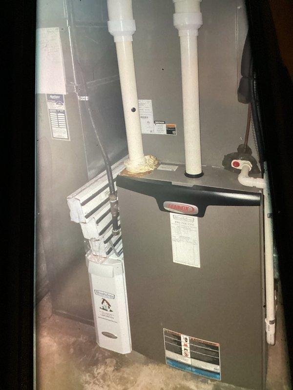 Completed comprehensive air conditioning tune-up on residential HVAC system. Inspected evaporator coil and condenser components, noting minor surface oxidation at coil seam but no performance issues. Verified proper operation of furnace unit, condensate pump, and all associated drainage systems.