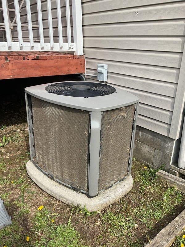 Completed routine maintenance on a five-year-old residential air conditioning system. Performed comprehensive inspection of outdoor condenser unit, cleaned heavily soiled exterior panels and coil fins to remove accumulated dirt and organic debris, checked refrigerant levels, tested electrical connections, verified proper fan operation, and confirmed system is operating within manufacturer specifications.