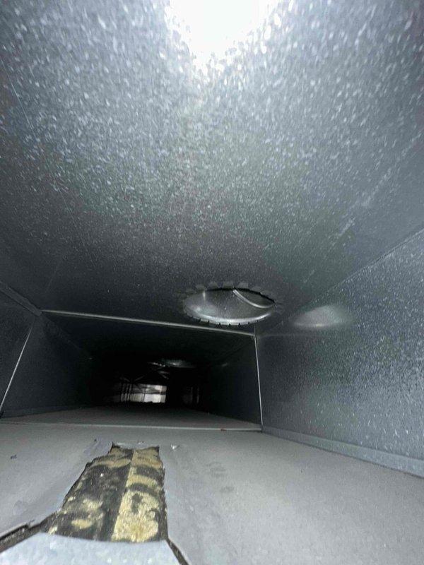 Completed comprehensive duct cleaning service for residential HVAC system covering up to 14 vents. Removed accumulated dust, debris, and particulate matter from interior ductwork surfaces using professional equipment. Documented pre-existing conditions showing significant dust buildup on duct floors and walls, then thoroughly cleaned all accessible sections of the ventilation system to restore optimal airflow and improve indoor air quality.