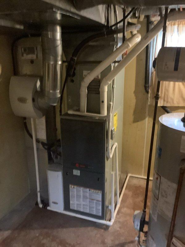 Reconnected 90% efficiency furnace and air conditioning system to operational status. Replaced deteriorated 6-inch supply duct run serving the dining room due to rust damage, salvaging and reinstalling the existing register and boot to maintain proper airflow distribution. Verified all mechanical connections, ductwork integrity, and system functionality upon completion.