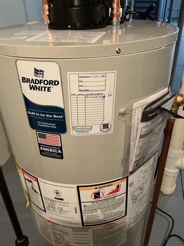 Replaced leaking Bradford White 50-gallon power vent water heater with new Bradford White 50-gallon power vent unit featuring 8-year manufacturer warranty. Installed new thermal expansion tank, retained existing cold water ball valve, eliminated electric anode rod, reworked hot water connections, and tied into existing exhaust vent pipe.