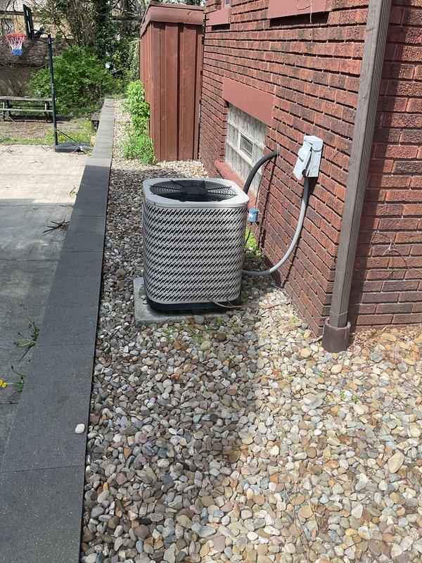 Responded to no-cool call on 10-15 year old residential AC unit. Upon arrival, found outdoor condenser unit not powering on. Verified electrical disconnect, checked voltage at unit, and inspected capacitor and contactor for signs of failure. Diagnosed failed run capacitor preventing compressor and fan motor operation. Replaced dual run capacitor with proper MFD rating, tested system startup, and verified normal amp draw on both compressor and condenser fan motor. Unit cooling properly at departure with normal temperature split across evaporator coil.