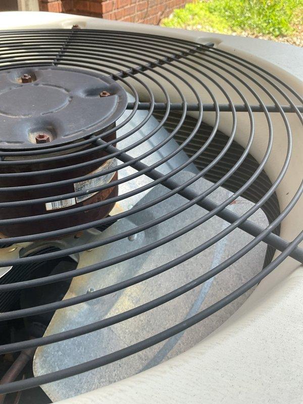 Responded to no-cool call on 10-15 year old residential AC unit. Upon arrival, found outdoor condenser unit not powering on. Verified electrical disconnect, checked voltage at unit, and inspected capacitor and contactor for signs of failure. Diagnosed failed run capacitor preventing compressor and fan motor operation. Replaced dual run capacitor with proper MFD rating, tested system startup, and verified normal amp draw on both compressor and condenser fan motor. Unit cooling properly at departure with normal temperature split across evaporator coil.