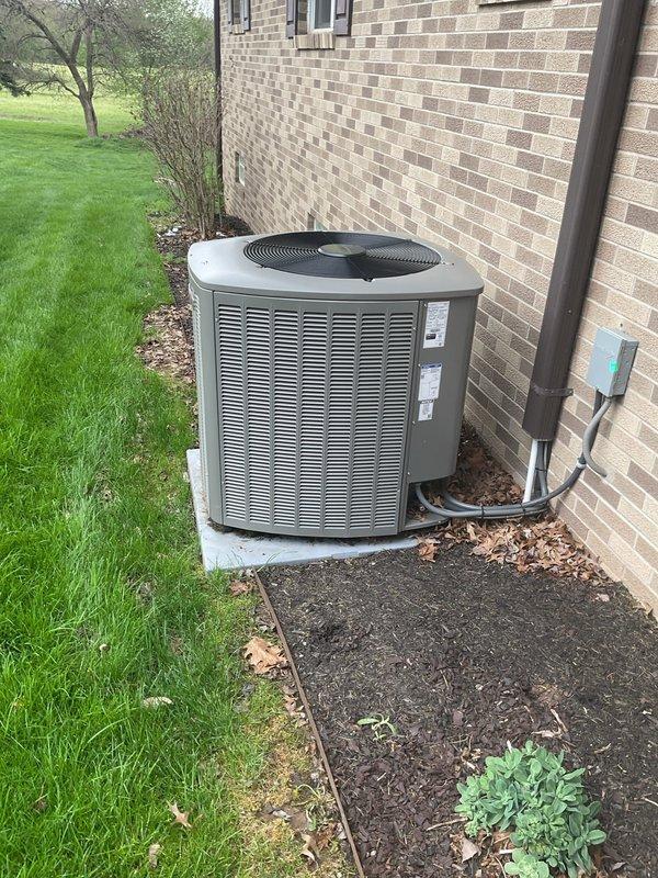 Completed MVP cooling maintenance visit on residential Lennox outdoor condensing unit. Performed standard preventive maintenance inspection, verified unit operational status, and documented equipment condition with photos showing clean exterior surfaces, intact components, proper pad placement, and adequate clearance from building and landscaping.