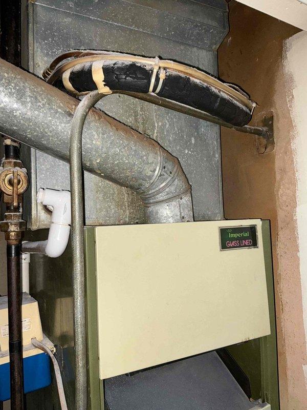 Conducted on-site assessment for complete furnace and air conditioning system replacement. Evaluated existing Imperial brand gas-fired furnace with glass-lined heat exchanger, associated ductwork including galvanized metal supply trunk and flexible insulated ducting, along with current residential HVAC infrastructure in mechanical room to provide comprehensive equipment replacement estimate.