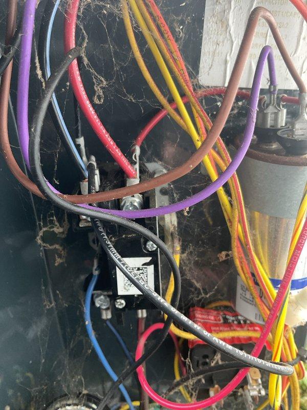 # HVAC Service Report

Responded to no cooling complaint on 5-year-old residential air conditioning system. Upon arrival, confirmed indoor blower motor operational but outdoor condensing unit failed to start. Performed visual inspection of outdoor unit, noting overgrown vegetation surrounding equipment and heavy cobweb accumulation on electrical components indicating lack of recent maintenance.

Conducted electrical diagnostics at condensing unit. Tested contactor operation and found failed to energize when thermostat called for cooling. Verified 24-volt control circuit present at contactor coil. Identified defective contactor as root cause preventing compressor and condenser fan motor from receiving power. 

Replaced failed contactor with new component rated to manufacturer specifications. Cleared excessive cobwebs from electrical panel and capacitor area to ensure proper ventilation and prevent future electrical issues. Verified all wire connections secure and properly terminated. Cy