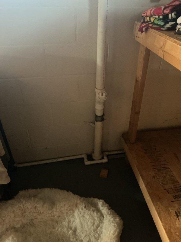 Responded to a clogged drain call at the scheduled time. Upon arrival, inspected the plumbing system in the basement utility area, including the PVC drainage lines and connections near the water heater. Cleared the obstruction from the drain line, verified proper water flow, and confirmed the system was functioning correctly before completing the service.