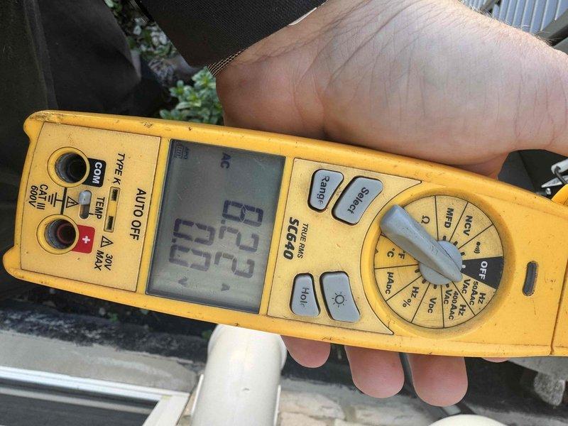 Completed scheduled preventive maintenance on residential air conditioning system. Performed comprehensive electrical diagnostics using digital multimeter to verify proper voltage and amperage readings across system components. Inspected and tested ECU drive board and main control circuit board, confirming all electronic components, capacitors, and integrated circuits functioning within normal parameters. Verified proper wiring connections at terminal blocks and checked all control voltages at 24VAC. All system measurements recorded within manufacturer specifications and unit operating efficiently.