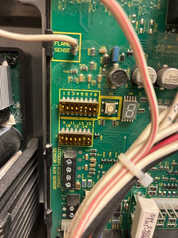 Completed scheduled BS-MVP heating maintenance visit on residential HVAC system. Performed comprehensive inspection of air handler unit, verified proper operation of all mechanical components, and examined control board including flame sense circuit and DIP switch configurations. Documented system condition with photographs showing furnace installation, refrigerant lines, condensate drainage, and control board components all functioning within normal parameters.