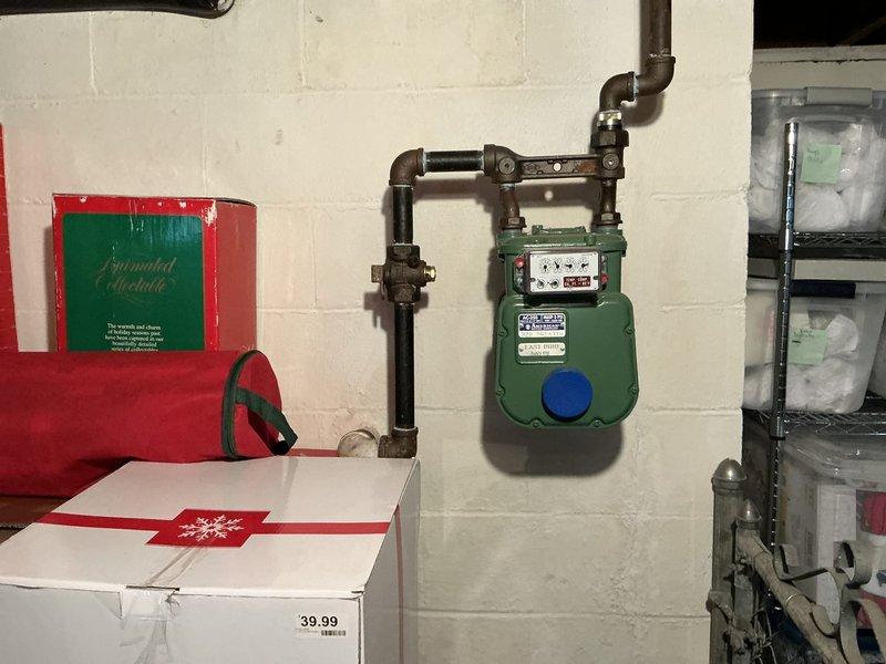 Conducted on-site electrical assessment for standby generator installation. Evaluated existing electrical infrastructure including main service panel capacity, available circuit breaker positions, and current electrical load distribution. Documented gas meter location and utility connections in basement area to determine optimal generator placement and fuel supply routing. Photographed electrical panel configuration showing circuit layout and available capacity for generator transfer switch integration. Assessment completed to provide comprehensive estimate for generator system installation including required electrical upgrades and transfer switch specifications.