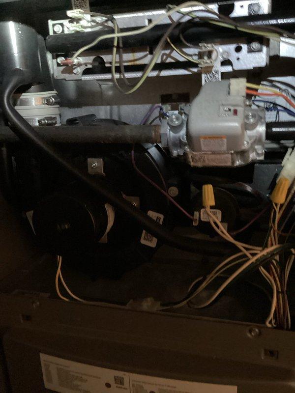 Completed routine MVP heating maintenance visit on residential HVAC system. Performed comprehensive inspection of furnace internal components including blower motor assembly, heat exchanger, circulator pump, and electrical connections. All wiring harnesses, wire nuts, and connection points were examined and found secure with proper routing throughout the unit. Verified operational status of all mechanical components with no issues identified during inspection.