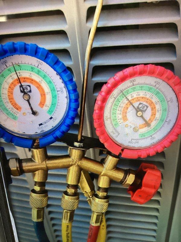 Disconnected and relocated outdoor condenser coil at homeowner's request, reinstalling unit in the same position. Verified system pressures and subcooling values using manifold gauges to ensure proper refrigerant charge and system operation after reconnection.