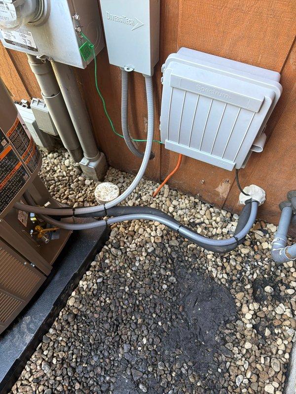 Completed a two-day HVAC installation involving the removal of an existing air conditioning system and installation of a new Lennox unit with coil replacement. The first day consisted of disconnecting and removing the old outdoor condensing unit, while the second day involved setting the new Lennox air conditioner on a protective rubber pad, installing the matching evaporator coil, and relocating the humidifier to optimize system performance. All refrigerant lines were properly connected and insulated, electrical disconnects were installed per code requirements, and condensate drainage was routed through PVC piping. The system was charged to manufacturer specifications, tested for proper operation, and verified for adequate airflow and temperature differential across the coil.