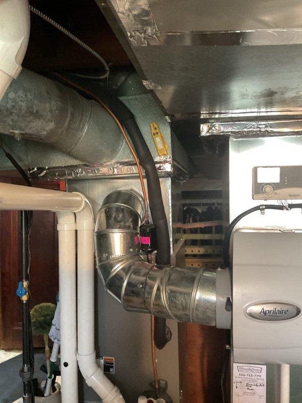 Completed MVP cooling maintenance visit on residential HVAC system consisting of Lennox furnace with integrated cooling components and Aprilaire humidifier. Performed comprehensive system inspection, verified proper operation of all equipment, documented system conditions through photographic records, and confirmed adequate airflow through ductwork and PVC condensate drainage lines.