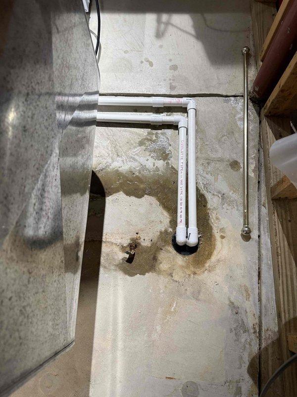 Responded to no cooling complaint on 5-month-old AC system with fan operation confirmed. Upon inspection, discovered condensate drain line issue affecting system performance. Cleared condensate blockage in PVC drain lines, verified proper drainage flow, and tested system operation. Unit returned to normal cooling function with proper airflow and temperature differential restored.
