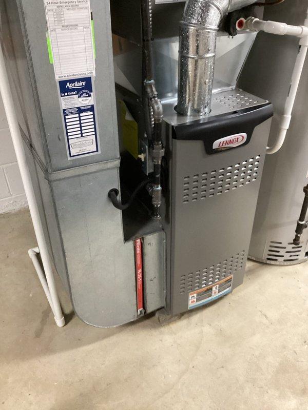 Completed AC maintenance on residential Lennox system with Aprilaire humidifier. Confirmed customer appointment, performed standard cooling season inspection and preventive maintenance procedures. Discussed maintenance plan renewal upon expiration and documented system condition with photos showing furnace, water heater, ductwork, and humidifier components all in proper working order.