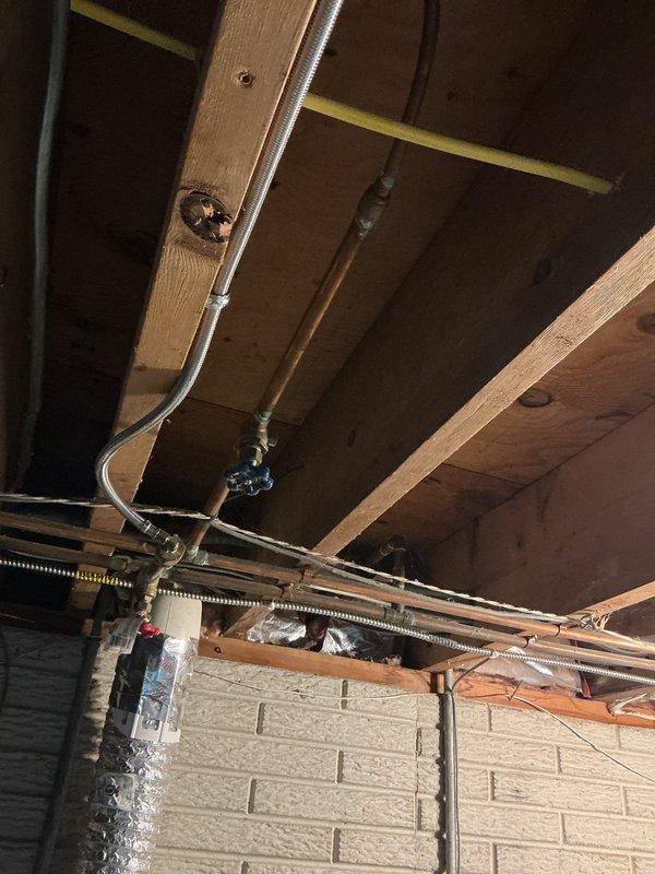 Conducted comprehensive plumbing estimate for residential property requiring multiple fixture installations and replacements. Assessed requirements for two exterior hose bibb installations, evaluated two toilet replacement needs including one unit photographed in main bathroom, and determined specifications for shut-off valve installation. Documented existing conditions through photographic documentation of bathroom fixtures and garage area for potential water line routing considerations. Provided detailed estimate covering all requested plumbing work with allowance for additional scope items to be identified during scheduled installation appointment.