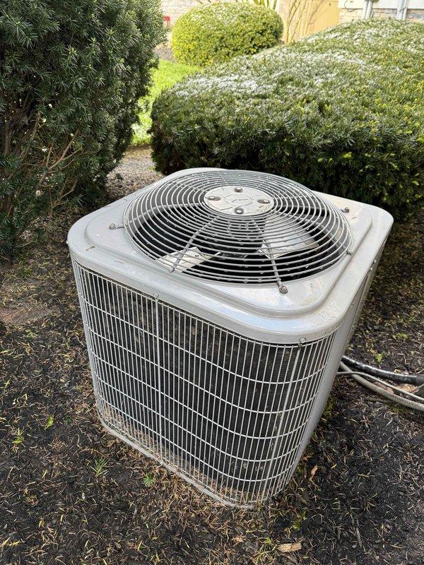 Completed preventive maintenance cooling visit on two 10-year-old residential air conditioning systems. Performed comprehensive inspection of both outdoor condenser units, including examination of fan motor assemblies, blower wheels, condenser coils, and refrigerant lines. Units showed normal wear consistent with age, with exterior surfaces displaying weathering and minor discoloration. Verified proper operation of all components, checked electrical connections, and ensured adequate airflow through condenser fins. Both systems operating within normal parameters upon completion of maintenance procedures.