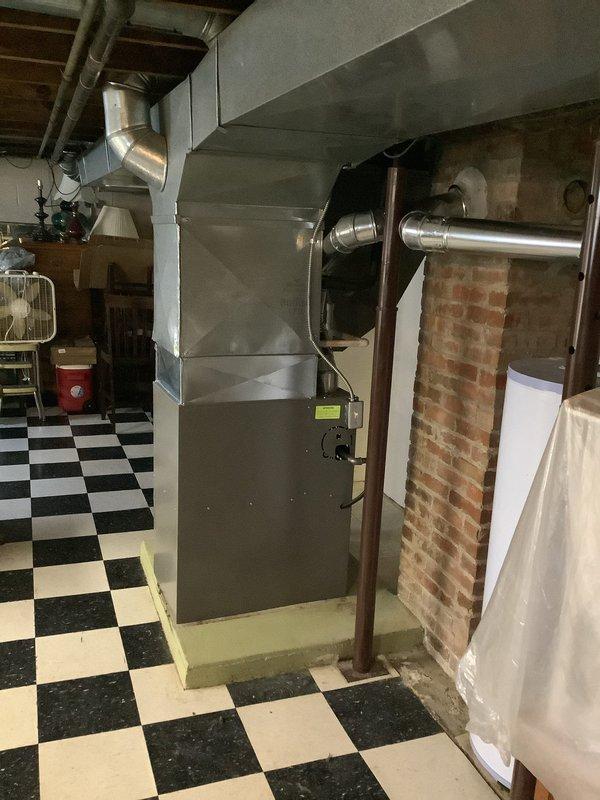 Responded to service call for Trane air conditioning system over 10 years old with inadequate cooling performance, unable to maintain temperature below 70 degrees. Performed diagnostic evaluation of outdoor condenser unit and indoor air handler system to identify cause of reduced cooling capacity and recommend necessary repairs or system maintenance.