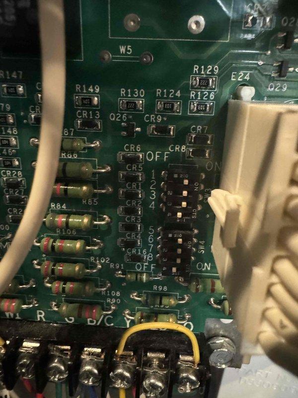Completed scheduled MVP heating maintenance visit on 12-year-old system. Performed comprehensive inspection of heating unit control board, verifying all electronic components, resistors, and circuit connections for proper operation. Documented equipment condition with detailed photos of control board assembly and ductwork markings for service records.