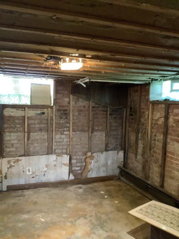 Conducted comprehensive electrical assessment of century-old residential property to provide estimate for complete house rewiring. Inspected exposed wiring in unfinished basement area, evaluated existing electrical infrastructure including panel capacity and branch circuit distribution, and documented current conditions throughout the home. No repair work was performed as this was an estimate-only consultation per customer request.