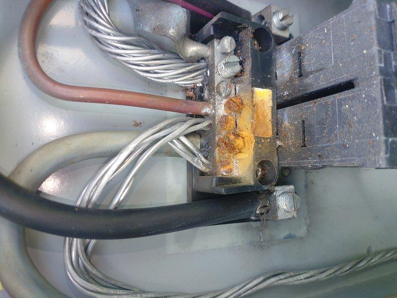 Responded to intermittent power loss affecting kitchen microwave and stove circuits. Upon inspection, discovered severe corrosion and rust on electrical terminal block connections serving these appliances. Corroded terminals were creating poor contact and intermittent power delivery, posing a potential fire hazard. Replaced damaged terminal block, cleaned and secured all wire connections, and verified proper power supply to both appliances to eliminate the intermittent fault condition.