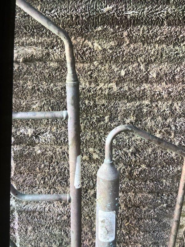 Responded to service call for 15-year-old air conditioning system experiencing intermittent cooling cycles. Upon inspection, diagnosed faulty compressor contactor and deteriorated refrigerant line insulation in attic space. Replaced defective contactor with OEM-spec component, securing all electrical connections. Re-insulated exposed refrigerant lines with proper R-value wrap to prevent condensation and maintain system efficiency. System tested through multiple cooling cycles, verified consistent operation with no interruptions, and confirmed proper amperage draw at compressor.