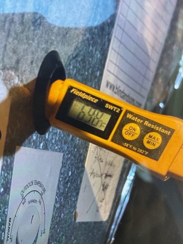 Completed annual cooling maintenance and AC tune-up on a 9-year-old air conditioning system. Performed comprehensive MVP inspection with system found operating properly. Verified outdoor condensing unit performance and documented supply air temperature of 94.0°F at ductwork, confirming adequate cooling operation and system functionality.